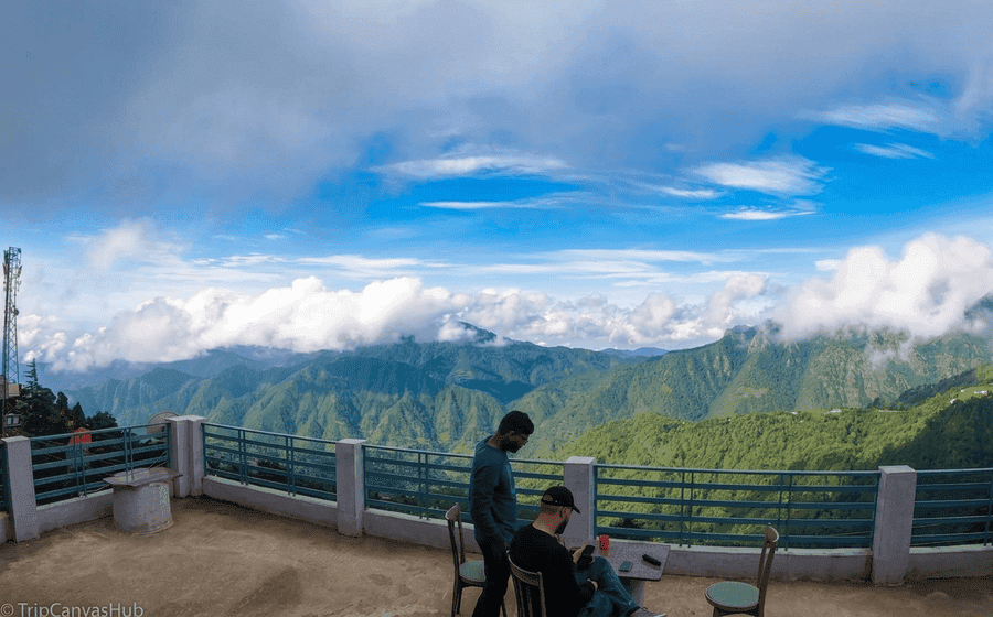 Scenic balcony view of the Himalayas from Kanatal – a top Offbeat hidden place in Uttarakhand TripCanvasHub.