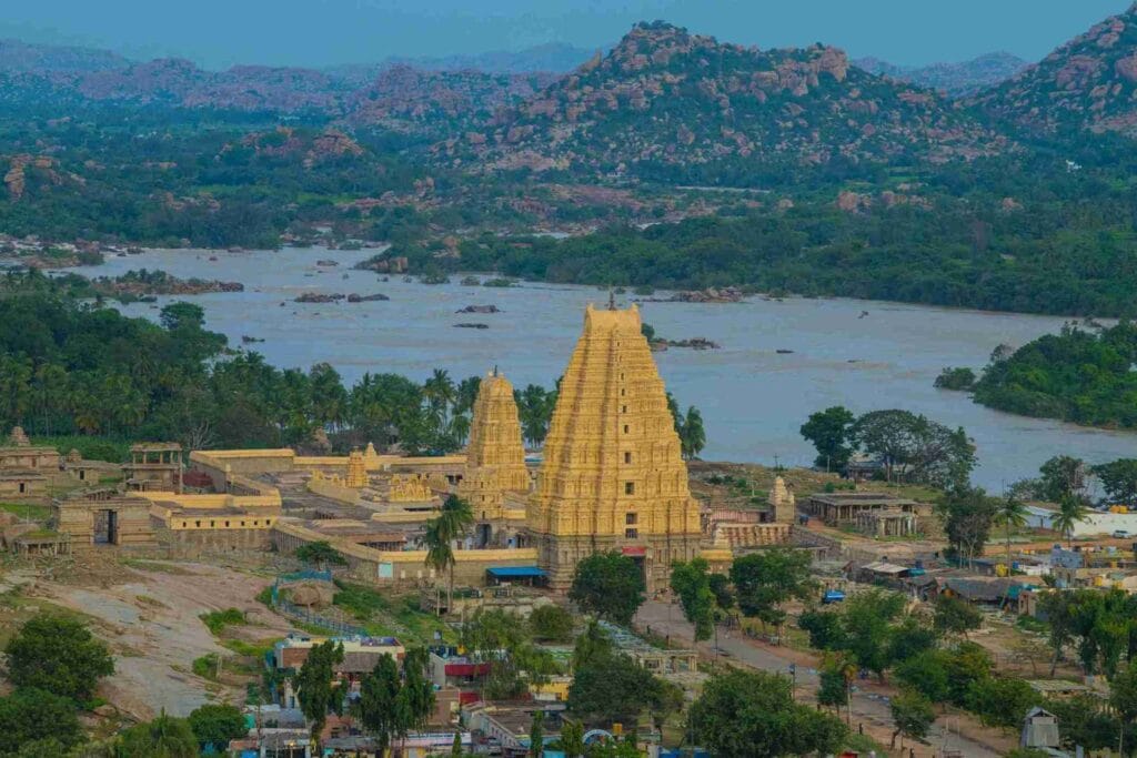 Aerial view of the ancient Virupaksha Temple in Hampi, Karnataka, one of the best places to visit in India in May for history lovers and unique landscapes.