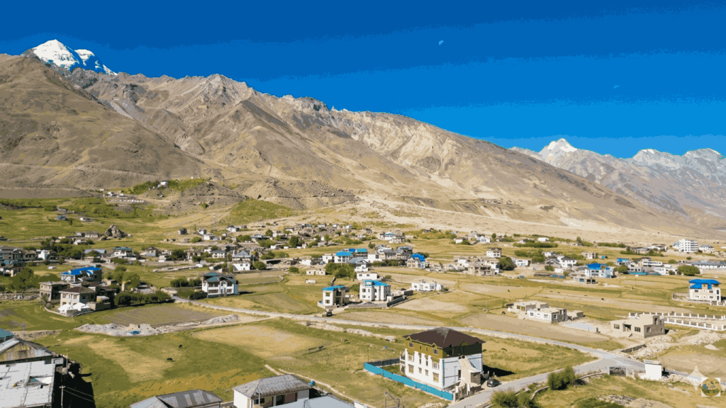 Panoramic view of Padum village in Zanskar Valley surrounded by the high Himalayan mountains, featured as one of the best places to visit in May in India 2026.