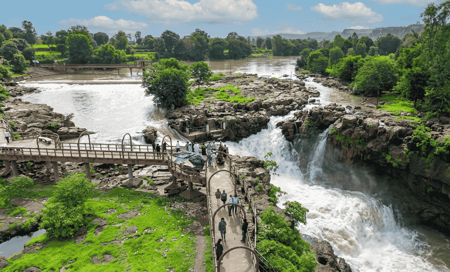 Aerial view of the Randha Falls in Bhandardara, featured as one of the 13 best places to visit in August in India 2026."