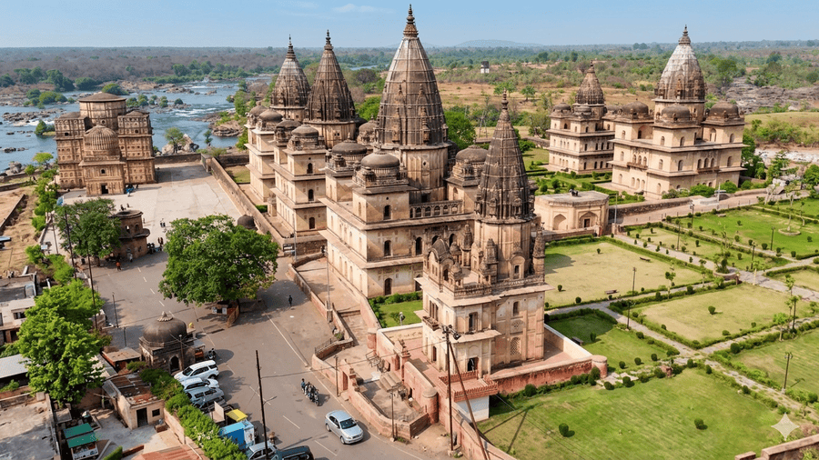 Aerial view of Orchha chhatris by the Betwa River, one of the 13 best places to visit in August in India 2026.