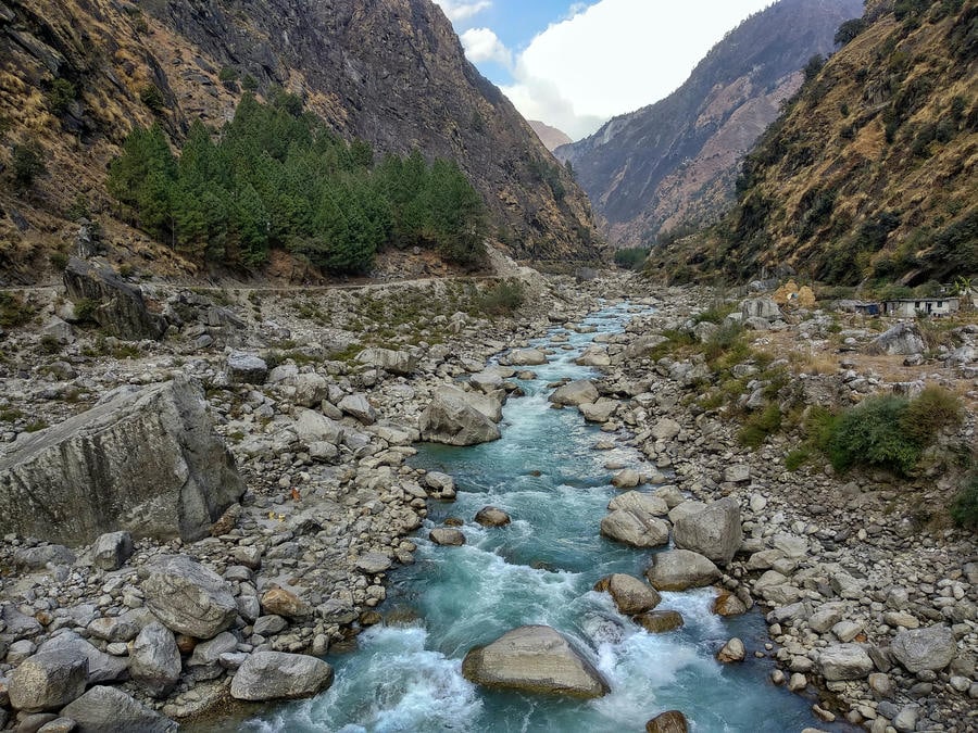 19 Best Places to Visit in December 2026: A rocky river flowing through the scenic mountain valleys of Pithoragarh, Uttarakhand.