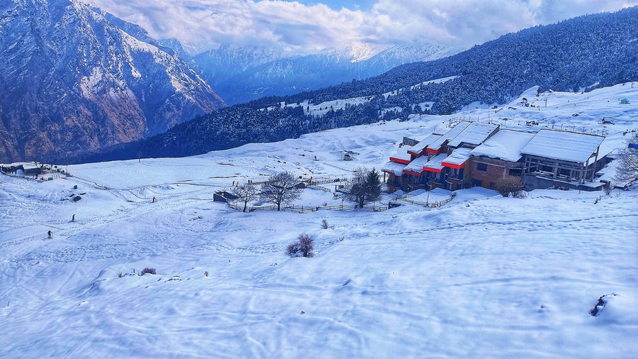 A scenic travel collage showcasing the 19 best places to visit in December in India 2026, highlighting winter destinations from snow-capped mountains to sunny coastal escapes.