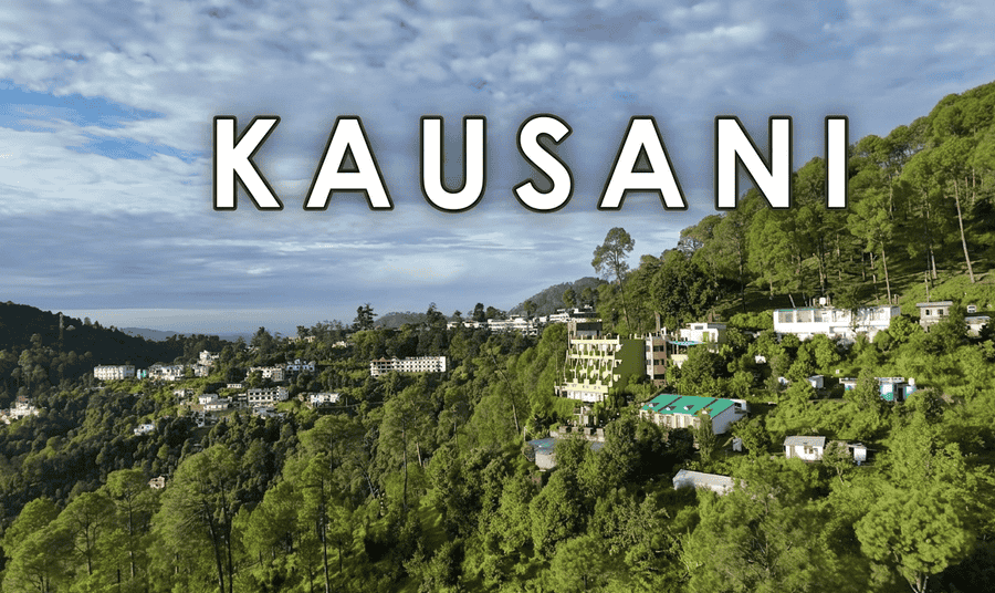 Aerial view of Kausani hill station, one of the 13 best places to visit in August in India 2026."