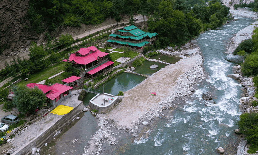 A peaceful riverside stay in Tirthan Valley, featured as one of the 15 best places to visit in November in India.