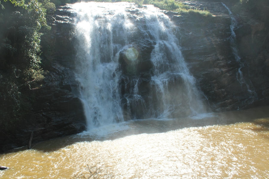 Abbey Falls waterfall rushing into a pool, one of the best places to visit in Coorg in 2026.