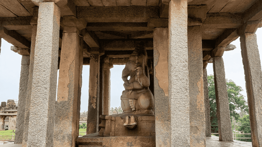 Sasivekalu Ganesha Temple, one of the best places to visit in Hampi, showcasing the monolithic statue within its pillared mantapa.