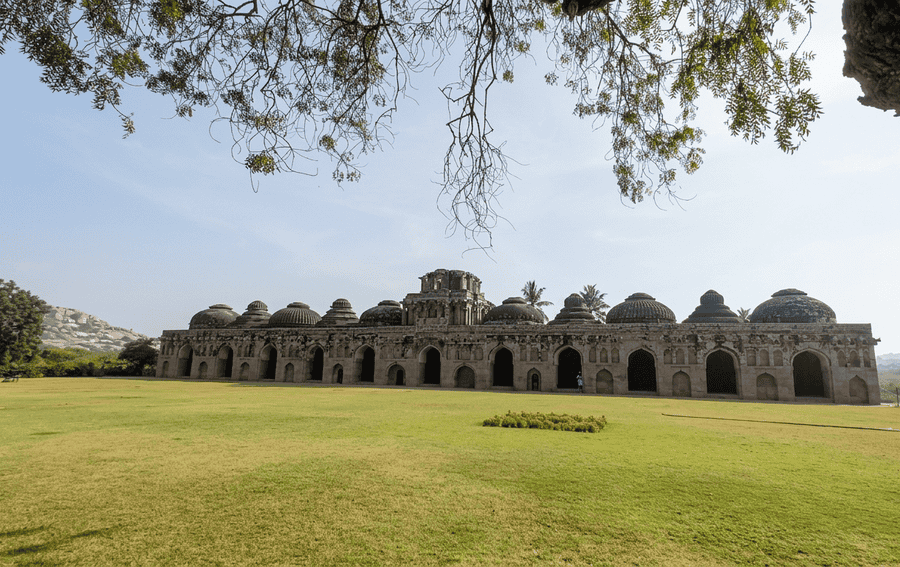 A wide-angle view of the historic Elephant Stables in Hampi, one of the best places to visit in Hampi.