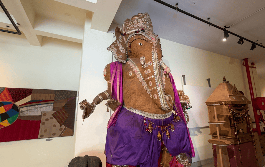 A large ornate Lord Ganesha statue made of coir fibre on display inside the International Coir Museum, highlighted as one of the Best Places to Visit in Alleppey