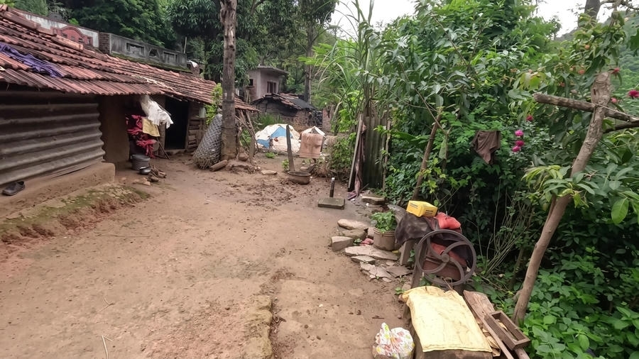 A high-quality photo capturing the authentic life and architecture at the Araku Tribal Village Museum, listed as one of the best places to visit Araku Valley.