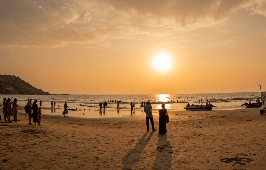 Golden sunset sky over the waves at Gokarna Main Beach - best places to visit Gokarna guide