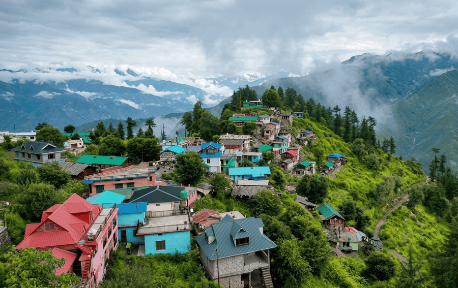 Colorful mountain village houses in Chakrata - best places to visit Uttarakhand guide