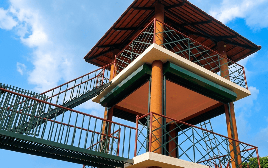 An elevated observation tower overlooking the scenic landscape at Chellarkovil, highlighted among the best places to visit Thekkady for panoramic nature views.