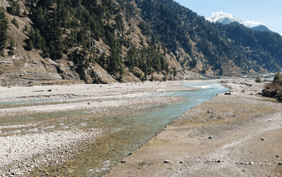 Scenic riverbank in Harsil Valley - best places to visit Uttarakhand guide