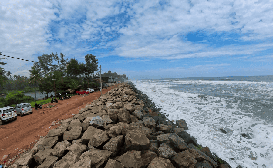 Aerial perspective of Kappil Beach with waves and palm trees – best places to visit Varkala guide