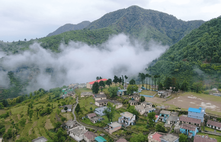 Scenic village and cloudy hills of Khirsu - best places to visit Uttarakhand guide