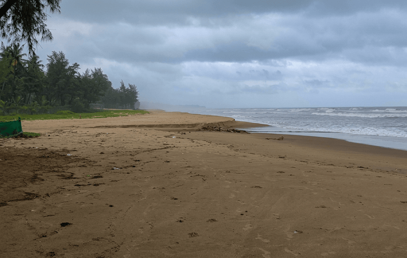 Wide scenic stretch of sandy Kumta Beach near Gokarna, one of the best places to visit in Gokarna
